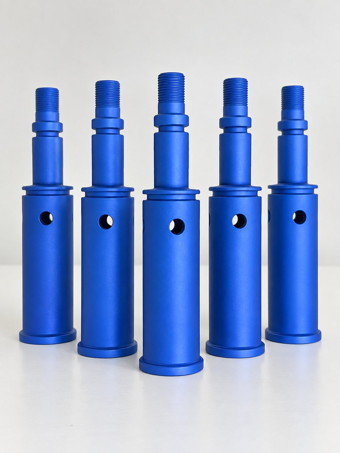 Piezas torneadas con anodizado tipo II acabado azul